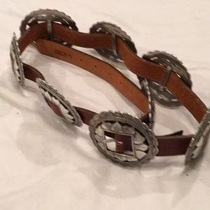 Brighton’s brown leather Calente Concho Belt